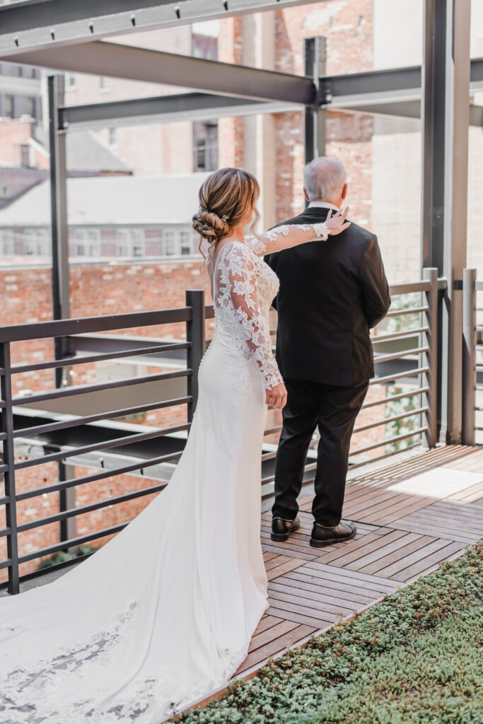 first look with dad on wedding day at excelsior observation deck