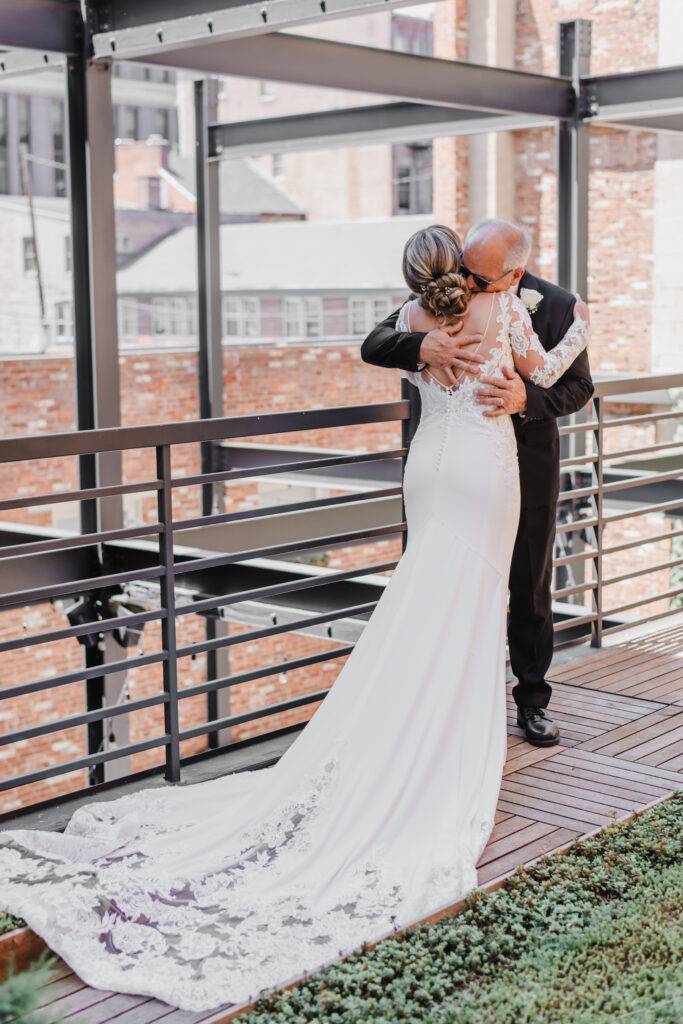 bride and father exchange first look