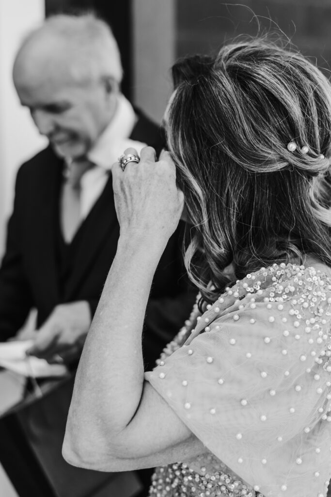 mom cries after receiving gift from daughter on wedding day