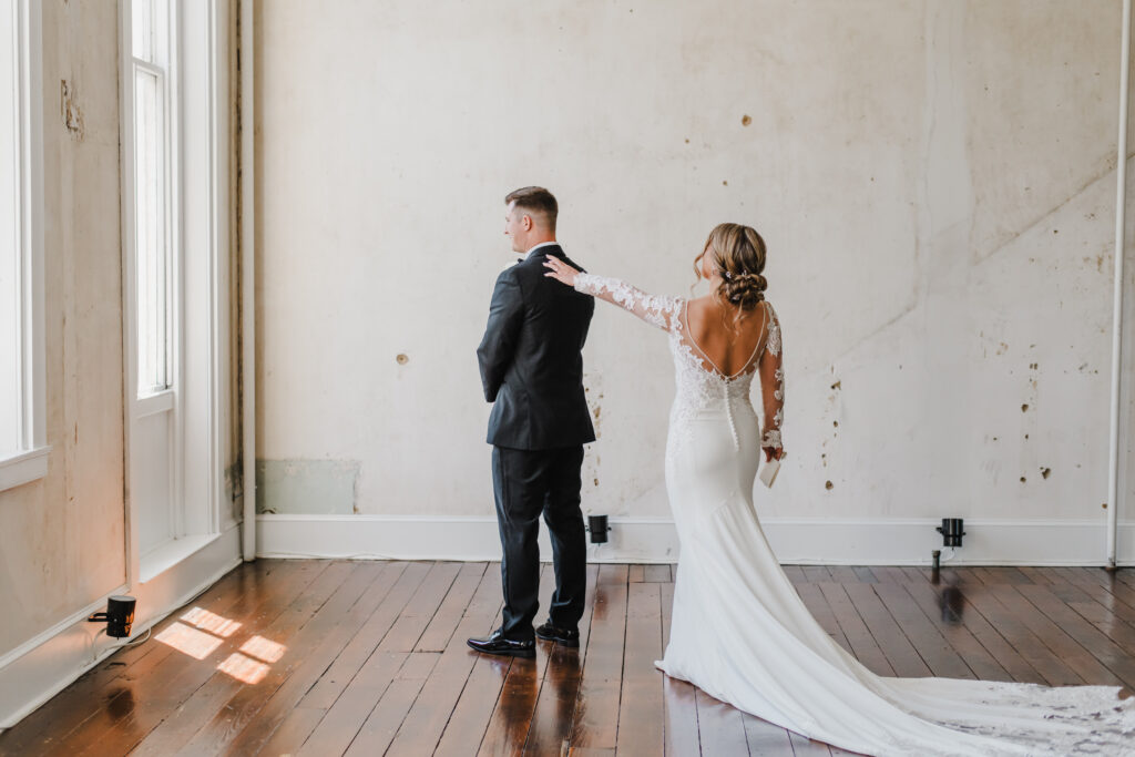bride and groom exchange first look at excelsior in lancaster pennsylvania