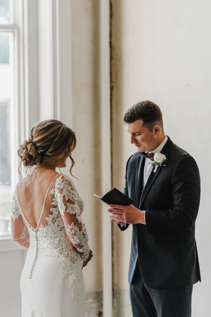 bride and groom exchange vows