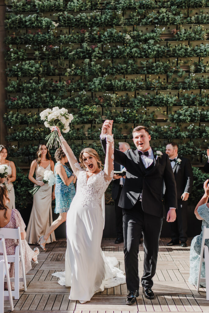 bride and groom celebrate after being married