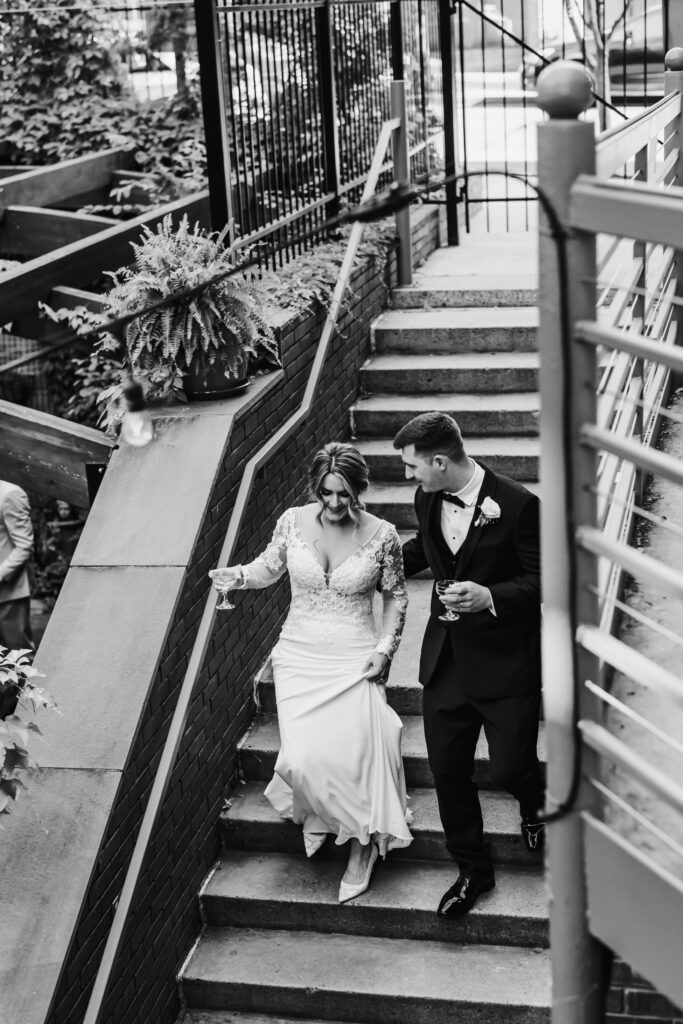 bride and groom enter cocktail hour