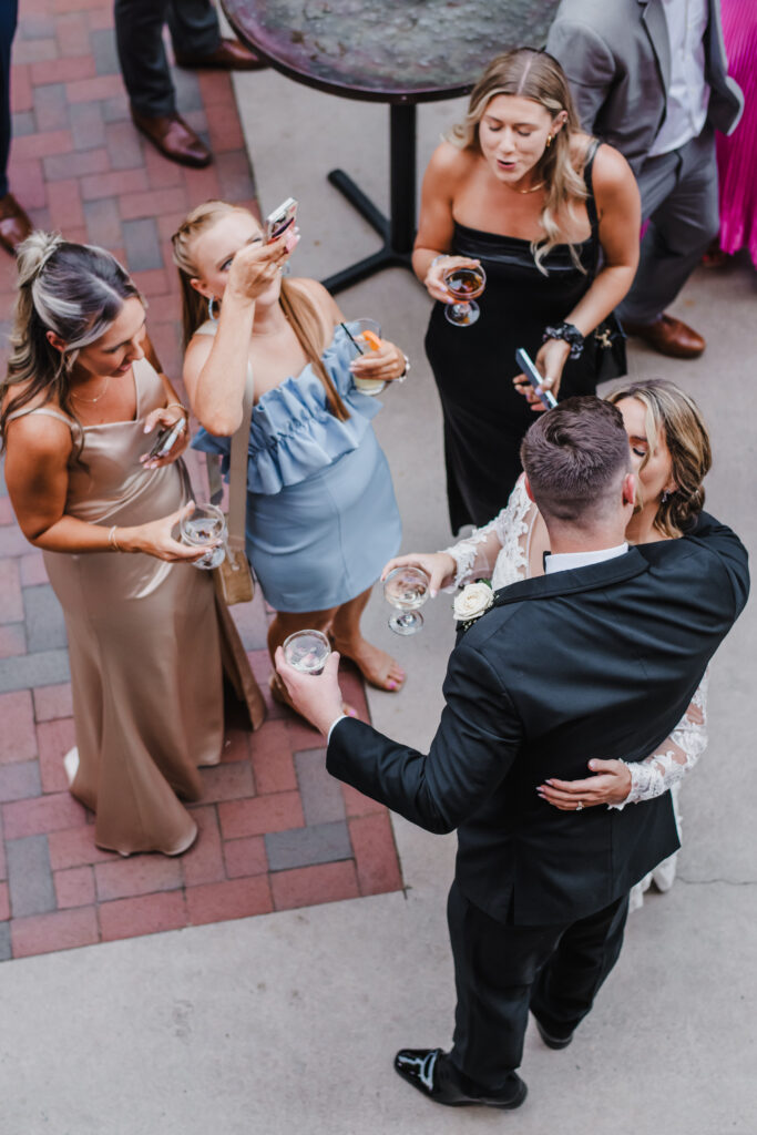 bride and groom interact with guests during cocktail hour
